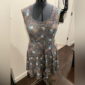 Large Alice in Wonderland Hot Topic skater dress. Stretchy fit.